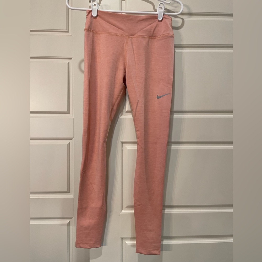 Nike Leggings size Small color Peachy pink